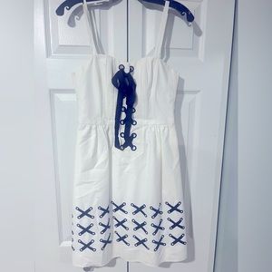 Beautiful Nanette lepore dress.  Never been worn. White and navy’s blue.
